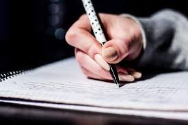 Students write exams